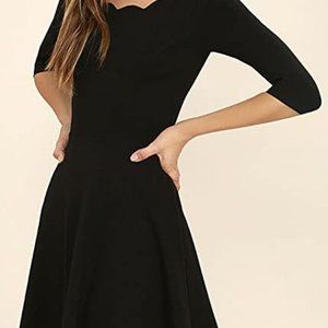 Scalloped neck baby doll dress